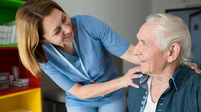 Physical therapist greeting a patient